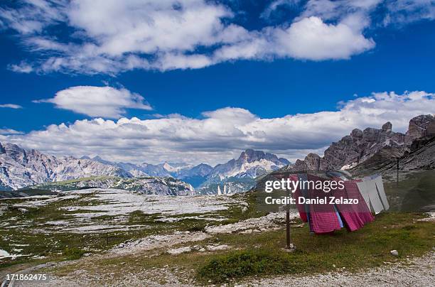 laundry in the dolomites - draped blanket stock pictures, royalty-free photos & images