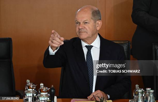 German Chancellor Olaf Scholz prepares to lead the weekly cabinet meeting in Berlin on October 11, 2023.