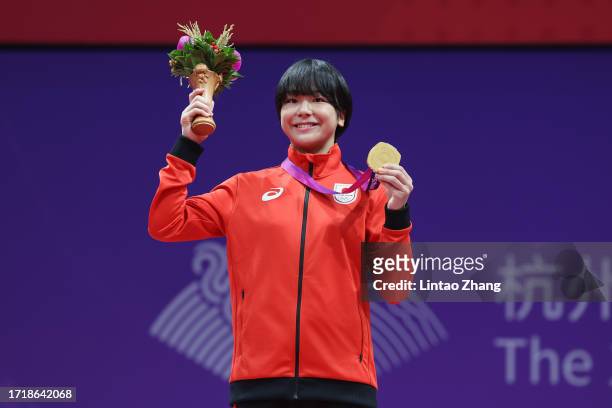 Gold medalist Akari Fujinami of Japan celebrate during the victory ceremony for the Women's Freestyle 53Kg Gold Medal Match in the Wrestling event of...