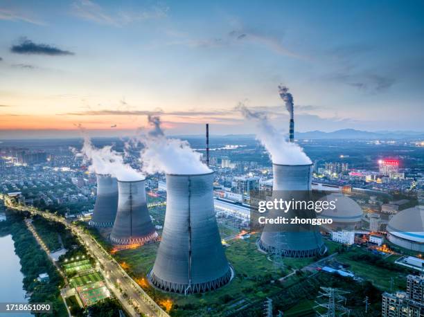 aerial photography of thermal power plant night scene - extreme weather events stock pictures, royalty-free photos & images