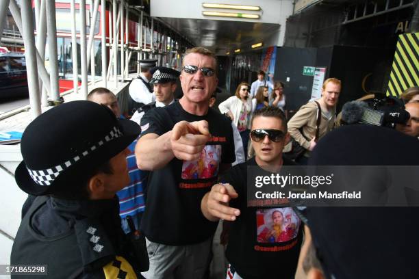 Joint EDL leaders Kevin Carroll and Tommy Robinson are arrested by police on June 29, 2013 in London, England. The leaders of the English Defence...