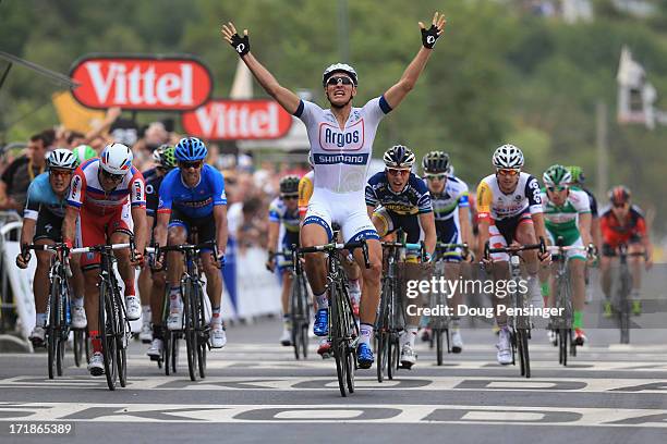 Marcel Kittel of Germany and Argos-Shimano celebrates after winning stage one of the 2013 Tour de France, a 213KM road stage from Porto-Vecchio to...