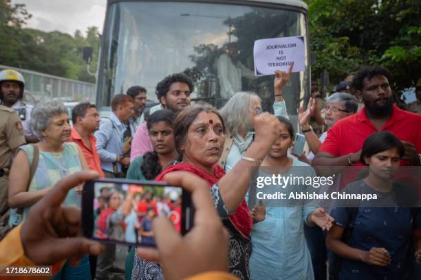 Woman chants slogans as she protests against the arrest of NewsClick’s founder and editor-in-chief Prabir Purkayastha and Amit Chakravarty, the...