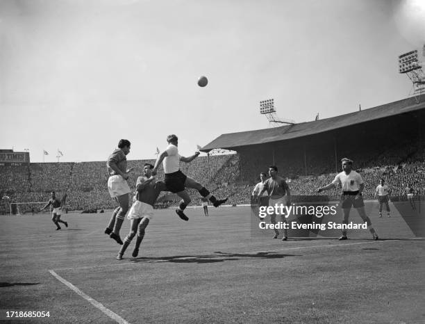 England and Italy players in action during an international friendly match at Wembley Stadium in London, May 6th 1959. England captain Billy Wright...