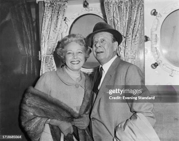 American actor and comedian Bert Lahr with his wife Mildred aboard a passenger liner, April 30th 1959.