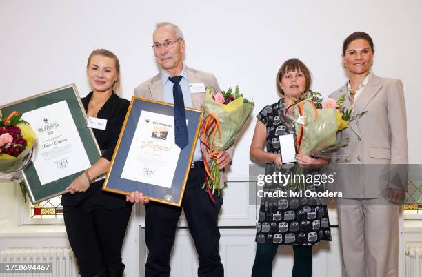 Crown Princess Victoria of Sweden poses for a picture with Therese Lindgren, winner of the Environmental Hero of the Year Prize, Claes Grundsten,...