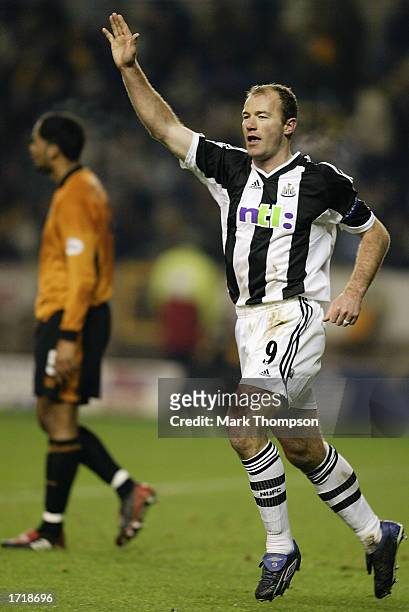 Alan Shearer of Newcastle United celebrates scoring a goal from the penalty spot during the FA Cup third round match between Wolverhampton Wanderers...