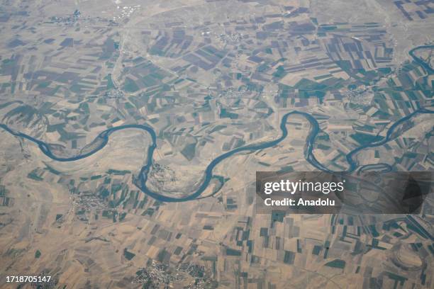 An aerial view of Murat River , taken from an airplane traveling over Turkiye and Azerbaijan in Mus, Turkiye on September 24, 2023.