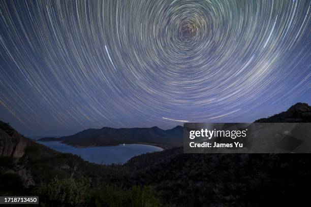 wineglass bay star trails - star trails stock pictures, royalty-free photos & images