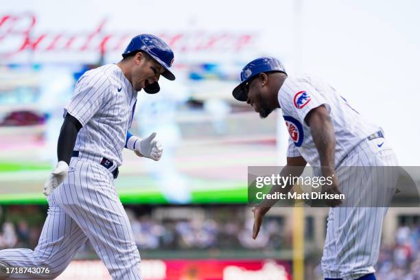 Seiya Suzuki of the Chicago Cubs celebrates a home run in a game against the San Francisco Giants at Wrigley Field on September 4, 2023 in Chicago,...