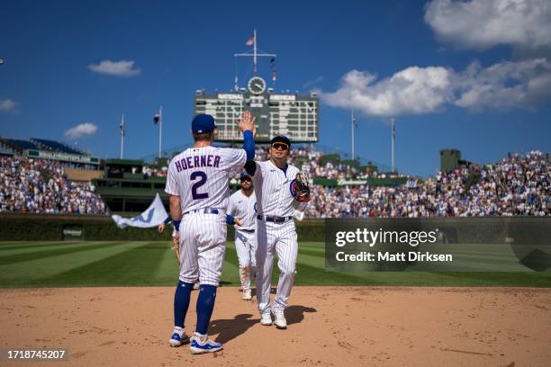 Seiya Suzuki and Nico Hoerner of the Chicago Cubs celebrate a win against the San Francisco Giants at Wrigley Field on September 4, 2023 in Chicago,...