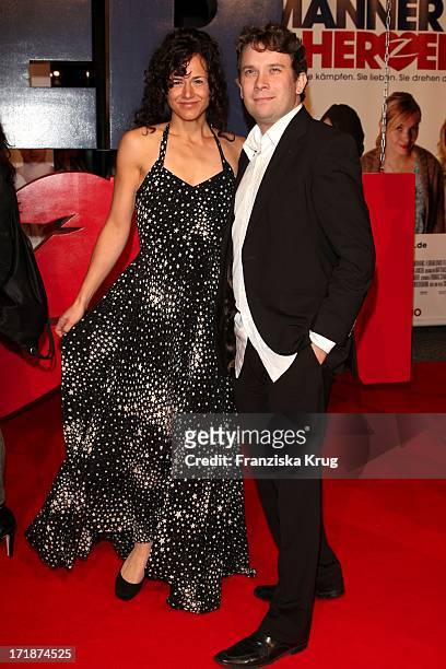 Christian Ulmen With Wife Huberta In The Germany premiere of the movie "Men in the City" in Cinemax on Potsdamer Platz in Berlin