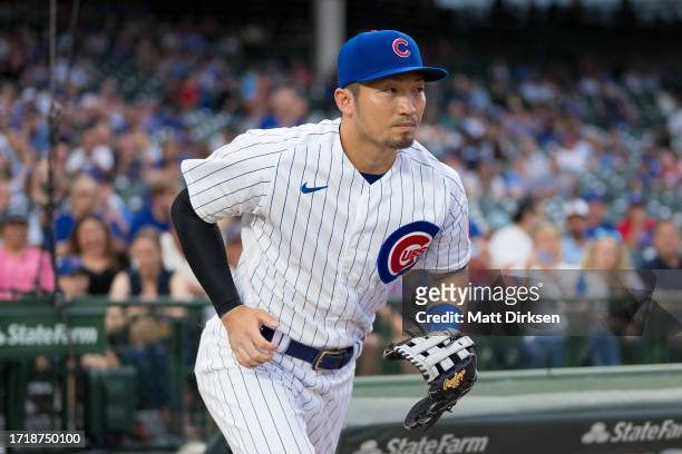 Seiya Suzuki of the Chicago Cubs takes the field in a game against the San Francisco Giants at Wrigley Field on September 5, 2023 in Chicago,...