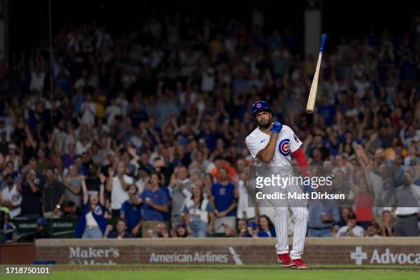 Jeimer Candelario of the Chicago Cubs flips his bat in a game against the San Francisco Giants at Wrigley Field on September 5, 2023 in Chicago,...