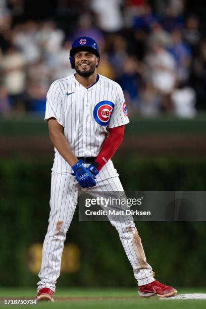 Jeimer Candelario of the Chicago Cubs reacts after hitting a double in a game against the San Francisco Giants at Wrigley Field on September 5, 2023...