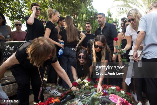 Family and friends of May Naim who was murdered by Palestinians militants at the "Supernova" festival, near the Israeli border with Gaza strip, react...