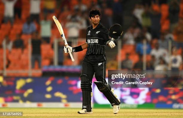 Rachin Ravindra of New Zealand celebrates their century during the ICC Men's Cricket World Cup India 2023 between England and New Zealand at Narendra...