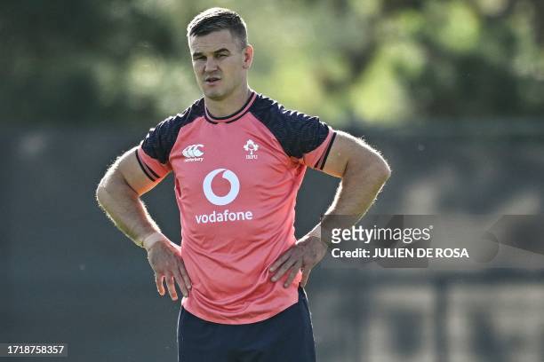 Ireland's fly-half Johnny Sexton takes part in a training session at Fauvettes Stadium, in Domont, north of Paris, on October 11 as part of the...