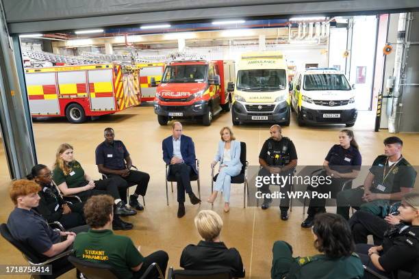 Prince William, Prince of Wales, with Dr Sian Williams, talks to staff during a visit to the Milton Keynes Blue Light Hub in Buckinghamshire, to...