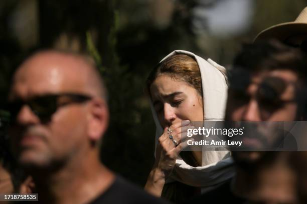 Family and friends of May Naim who was murdered by Palestinians militants at the "Supernova" festival, near the Israeli border with Gaza strip, react...