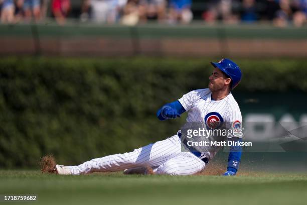 Cody Bellinger of the Chicago Cubs slides in a game against the San Francisco Giants at Wrigley Field on September 6, 2023 in Chicago, Illinois.
