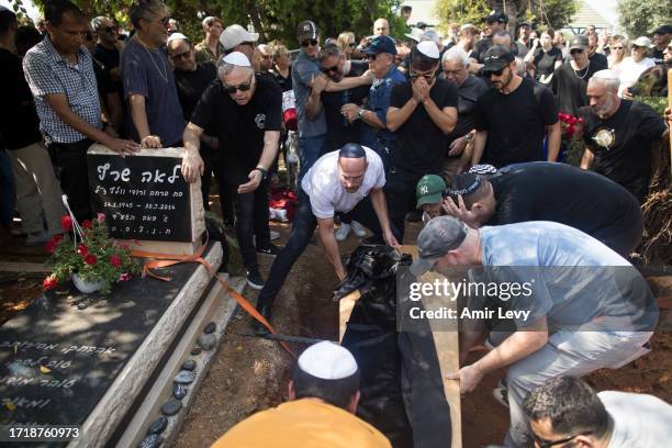 Family and friends of May Naim who was murdered by Palestinians militants at the "Supernova" festival, near the Israeli border with Gaza strip, react...