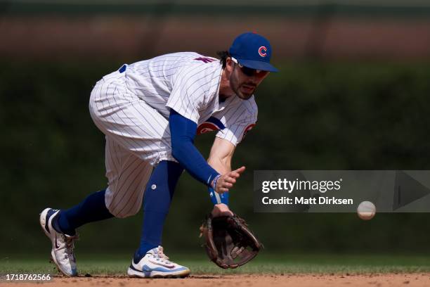 Dansby Swanson of the Chicago Cubs Field the ball in a game against the San Francisco Giants at Wrigley Field on September 6, 2023 in Chicago,...