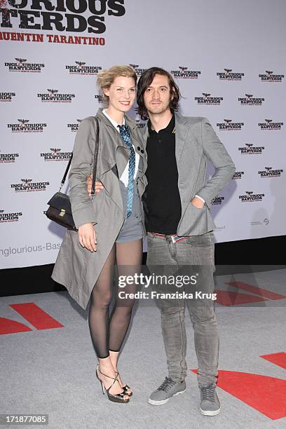 Eva Briegel With Andy Penn Upon arrival to Inglourious Basterds premiere in the theater at Potsdamer Platz in Berlin