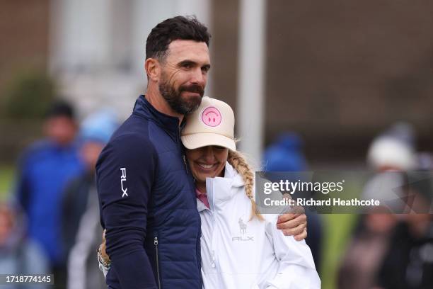 Billy Horschel of the United States embraces his Wife, Brittany on the 18th hole during Day One of the Alfred Dunhill Links Championship at...