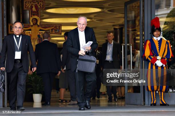 Austrian Cardinal Christoph Schönborn leaves the Paul VI Hall at the end of the first meeting of the XVI Ordinary General Assembly of the Synod of...