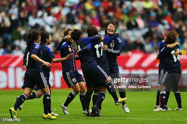 Yuki Ogimi of Japan celebrates her team's second goal with team mates during the Women's International Friendly match between Germany and Japan at...