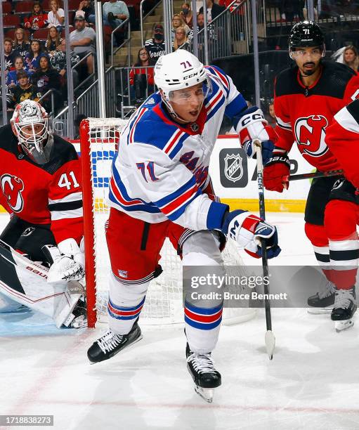 Tyler Pitlick of New York Rangers skates against the New Jersey Devils at Prudential Center on October 04, 2023 in Newark, New Jersey.