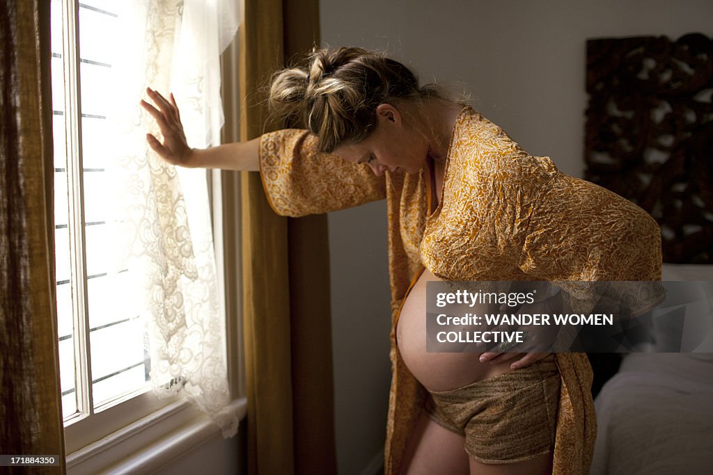 Pregnant woman In labour contractions at home