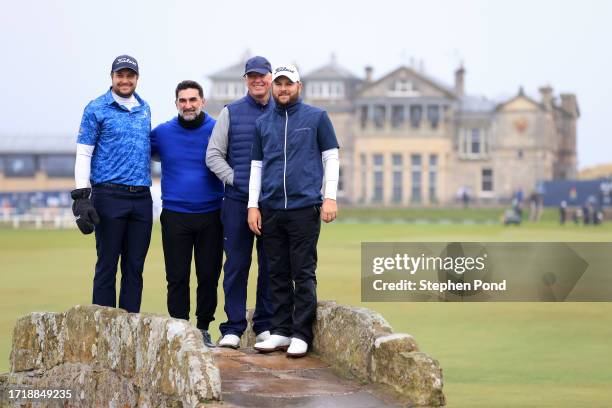 Peter Uihlein of the United States and Matthew Jordan of England pose on the Swilcan Bridge with their playing partners, LIV Golf Chairman, Yasir...