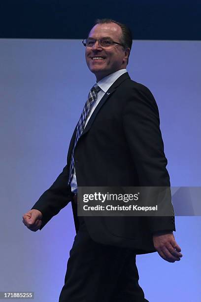 Chairman Clemens Toennies smiles after being voted during the FC Schalke 04 annual meeting at Veltins Arena on June 29, 2013 in Gelsenkirchen,...