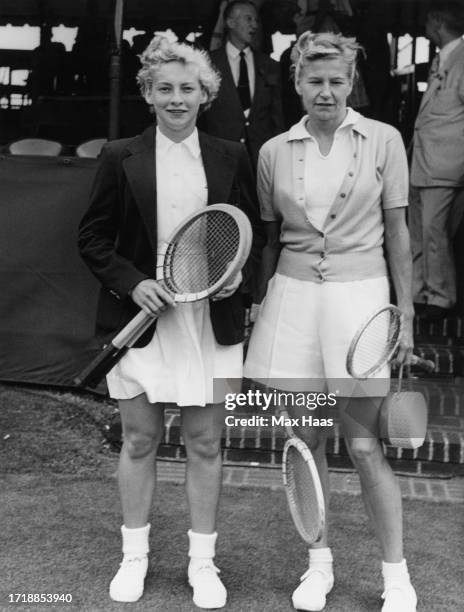 American tennis player Darlene Hard and her opponent, American tennis player Louise Brough ahead of their semifinal match of the women's singles...