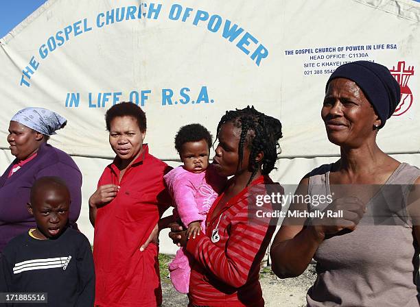 As Nelson Mandela remains in a critical condition at Pretoria's Mediclinic Heart Hospital, a community from The Gospel Church of Power in Khayelitsha...