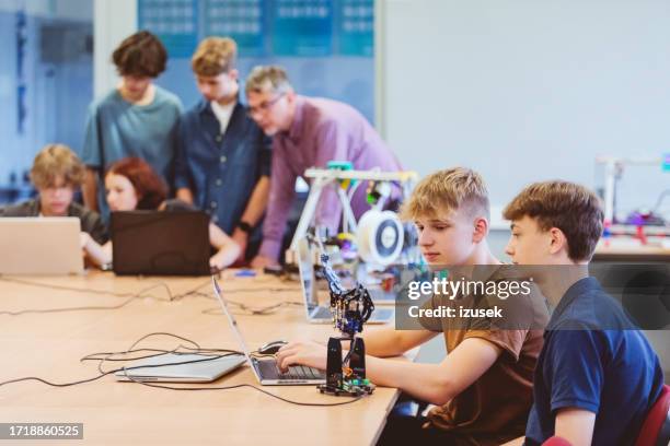 high school students during robotics programming lesson - classroom wide angle stock pictures, royalty-free photos & images