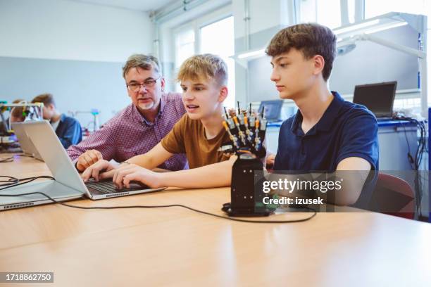 two high school students during robotics programming lesson - digital education stock pictures, royalty-free photos & images