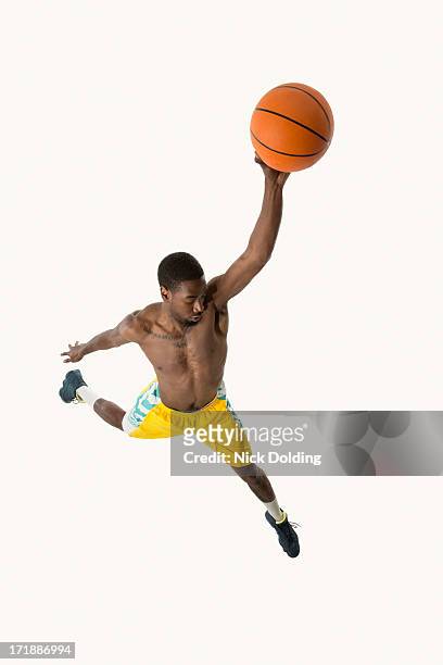 flying basketball player 19 - man studio shot stock pictures, royalty-free photos & images