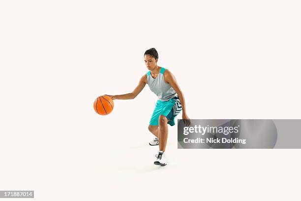 basketball player dribbling 09 - dribbling sport fotografías e imágenes de stock