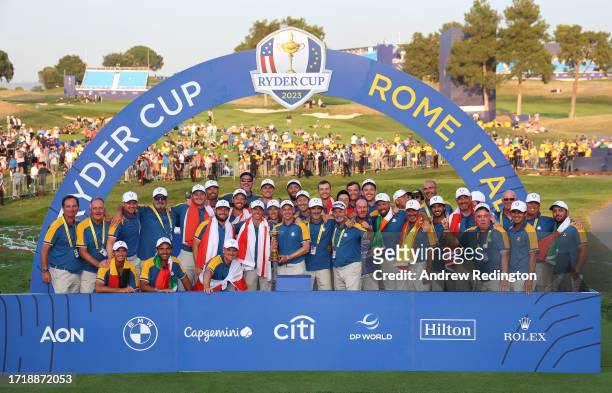 Luke Donald, Captain of Team Europe, lifts the Ryder Cup trophy following victory with 16 and a half to 11 and a half win during the 2023 Ryder Cup...