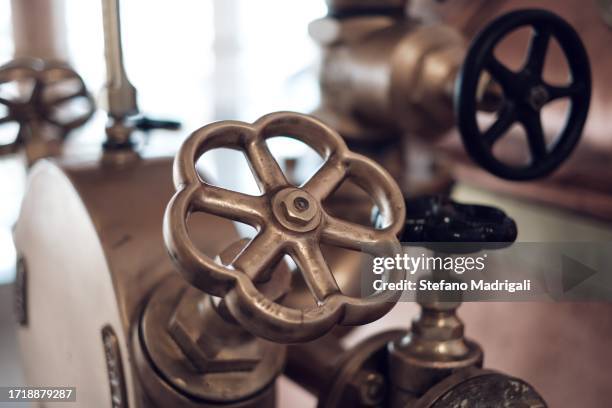 factory brass and copper knobs - gate valve stock pictures, royalty-free photos & images