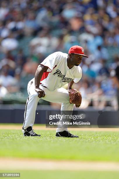 Alfredo Figaro of the Milwaukee Brewers pitches during the game against the Atlanta Braves at Miller Park on June 23, 2013 in Milwaukee, Wisconsin.