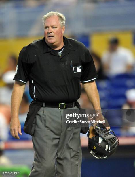 Umpire Tim Welke looks on during a game between the Minnesota Twins and the Miami Marlins at Marlins Park on June 26, 2013 in Miami, Florida.