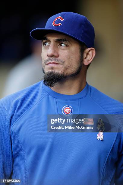 Matt Garza of the Chicago Cubs gets ready in the dugout before the game against the Milwaukee Brewers at Miller Park on June 26, 2013 in Milwaukee,...