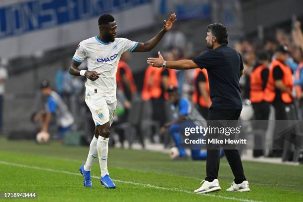 Chancel Mbemba of Marseille celebrates with Gennaro Gattuso, Manager of Marseille, after scoring the team's first goal during the UEFA Europa League...