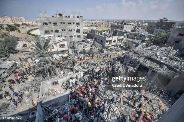 An aerial view of the search and rescue operations in the destroyed buildings and rubble after the Israeli airstrikes that has been going on for five...