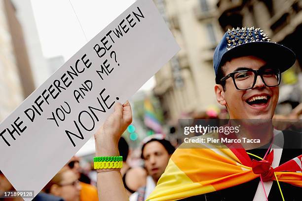 Activists and supporters of gay rights attend the annual Gay Pride parade on June 29, 2013 in Milan, Italy. The parade is part of a World Pride Week...