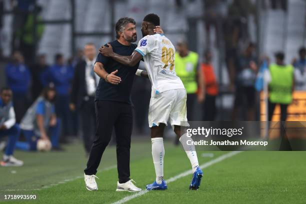 Chancel Mbemba Mangulu of Olympique De Marseille celebrates with Gennaro Gattuso Head coach of Olympique De Marseille after scoring to give the side...